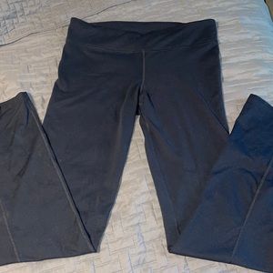 Under Armour black exercise pants.